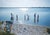 Crabbing In The Hamptons by Toni Frissell Family and friends are crabbing on a beach in Long Island, Hew Hamptons August...