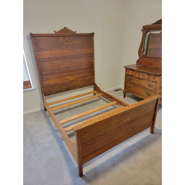 Offered here is one piece from a long-preserved American quarter-sawn tiger oak bedroom suite dating to approximately...