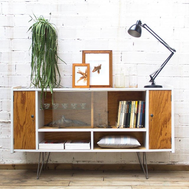 A 1960’s sideboard renovated and transformed into a combination of natural wood and white. with an industrial touch...