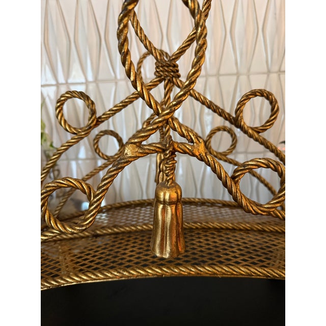 Vintage Italian Hollywood Regency Gilt Metal Rope & Tassel Magazine Rack dimensions: 18" x 8" x 22" Shipping costs are...