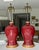 Pair of vintage Asian Sang De Boeuf "Oxblood" glazed vases as table lamps mounted on giltwood bases. They have the Meiping...