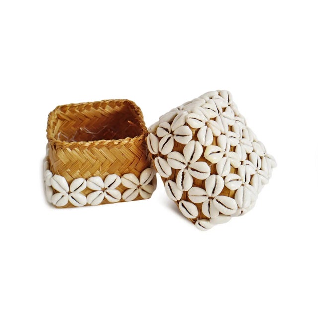 Vintage handmade cowry shell on woven grass box. Beautiful charming small decorative box to display and/or hold your...