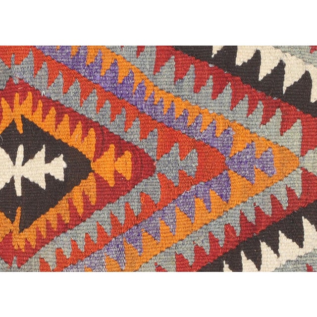 Bring a unique and traditional style to your home with this handcrafted Vintage Turkish Kilim. Boasting a classic wool-on-...