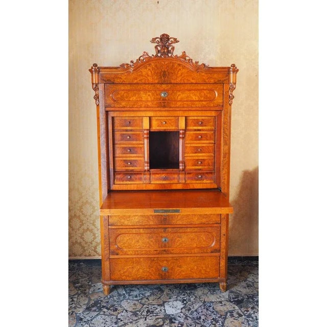 Walnut and root wood secretaire with drawers inside; A knob to change in a small drawer.