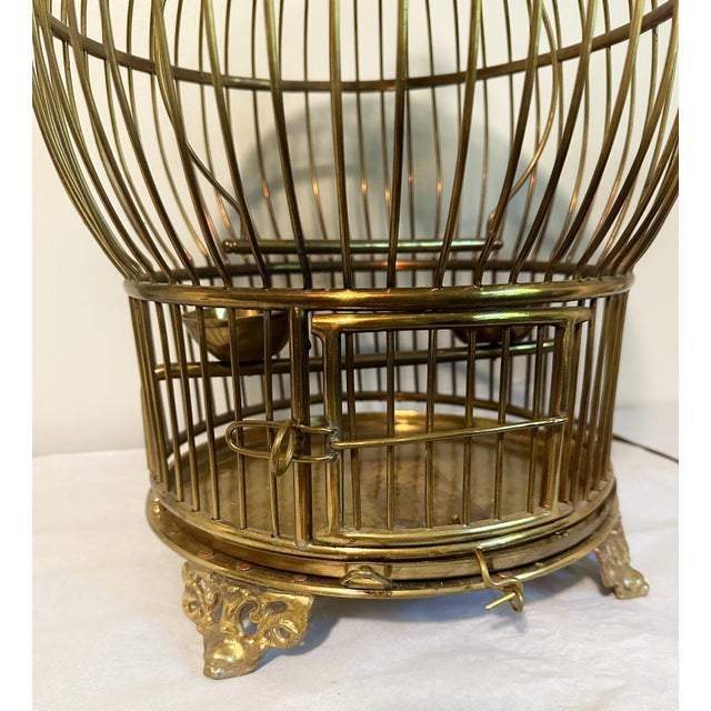 Vintage Large Solid Brass Globe Shaped Hanging BIrd Cage W/Feeding Bowls For Sale - Image 4 of 6