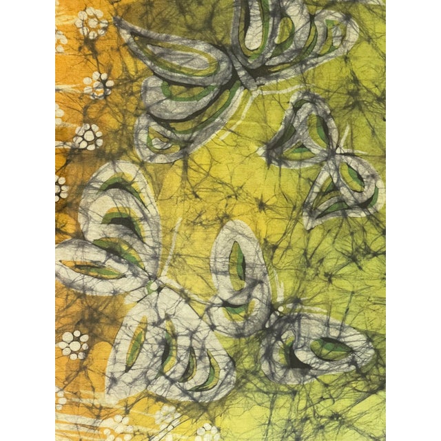 Original mixed media on batik framed between two glasses, so it can be placed upon the window as screen / lets the sun...