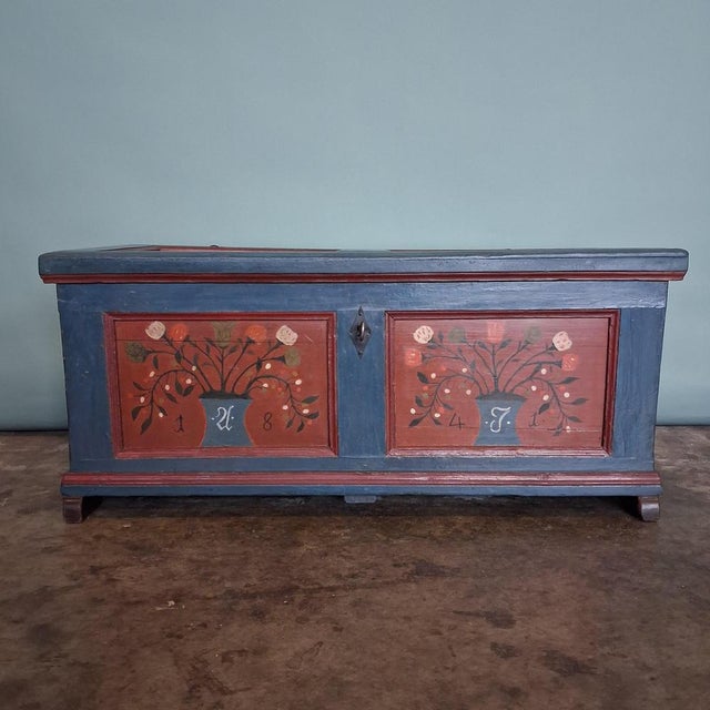 This authentic antique folk art chest originates from the rural tradition of the 19th century. Crafted from solid...