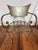 Set of 5 vintage hand forged steel armchairs crafted in neoclassical Hollywood Regency style. The curved metal backrests,...