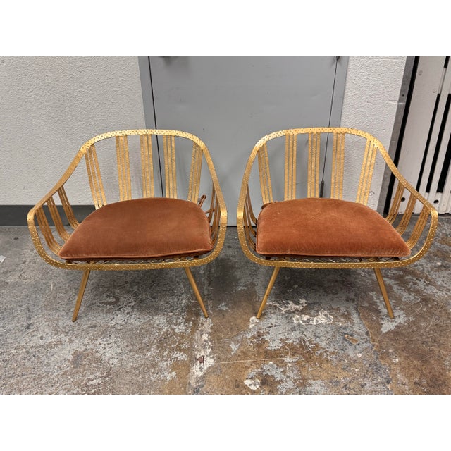 Design Plus Gallery presents the Pair of Gala Gold Lounge Chairs from Cb2. This pair of lounge chairs showcases gold-tone...