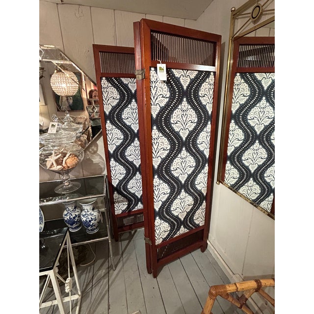 Great looking vintage mahogany 3 panel screen newly updated with ikat blue and white fabric inside the panels. Each panel...