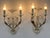 Set of two exceptional, large, elegant and highly decorative mid-century modern brass sconces or wall fixtures. Designed &...