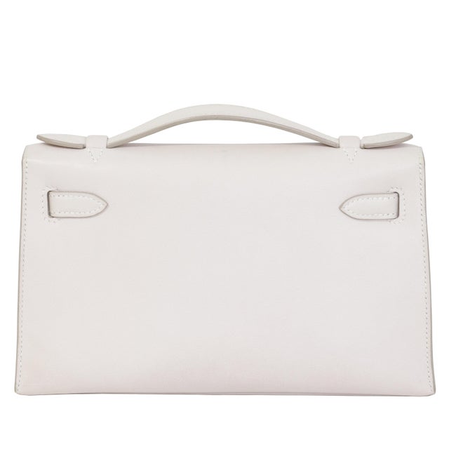 Animal Skin Hermès Kelly Pochette Rose Dragée Swift Palladium Hardware 2007 For Sale - Image 7 of 9
