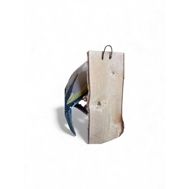 A folk art bird from Austria — hand carved wood. Measures 4.5" x 4.5" x 2.5". A charming folk-art carving for a shelf,...