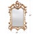 A Chippendale Gold Leaf Mirror from Niagara Furniture, the bevelled glass having been hand cut and fitted to the hand...