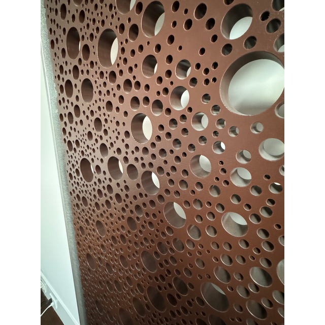 A large-scale wall sculpture by American sculptor Michael Enn Sirvet, created in 2013. The piece is constructed from...