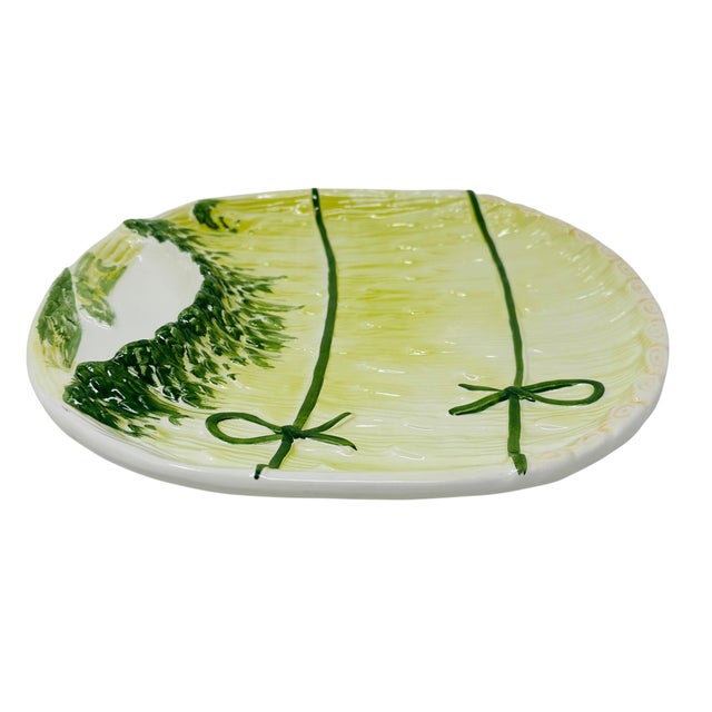 Elevate your spring tablescape with this stunning vintage Portuguese majolica-style asparagus serving platter. Crafted by...
