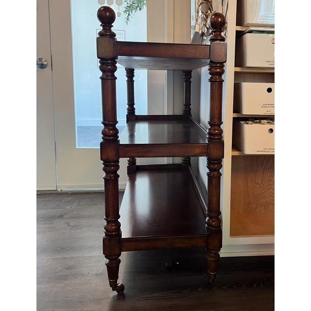 This understated, solid mahogany buffet table is the perfect addition to any room. It's delicately carved legs frame...