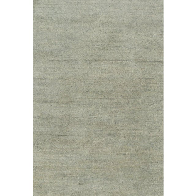 Hand knotted in a fine blend of wool & silk, a scintillating 8x10 design from Rug & Kilim’s Texture of Color Collection. A...