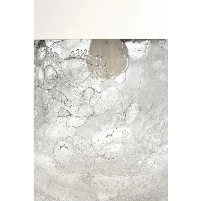 This vintage Italian pendant lamp is made of heavy glass with a chromed canopy. Up to 250V (Europe/UK Standard).The wiring...