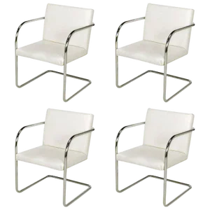 Four Thonet White and Chrome Cantilever Dining Chairs