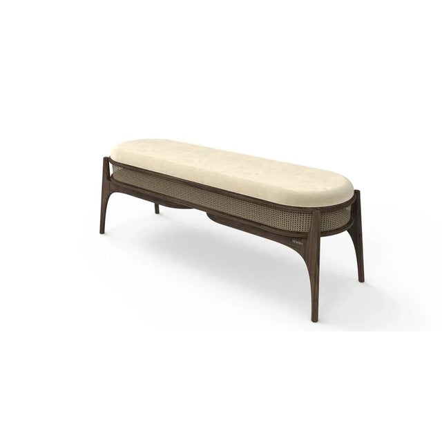 Mudhif bench features a structure in solid walnut wood and natural leather that gives it a sober and elegant look. Labeled...