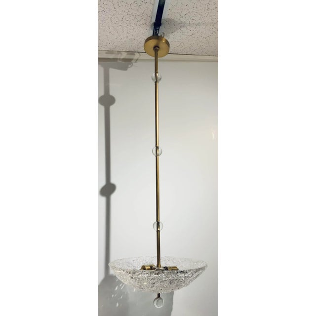 Original Retail $1625, stylish Arteriors Modern Glass and Brass Wendelin Chandelier , textured glass bowl, brass finished...