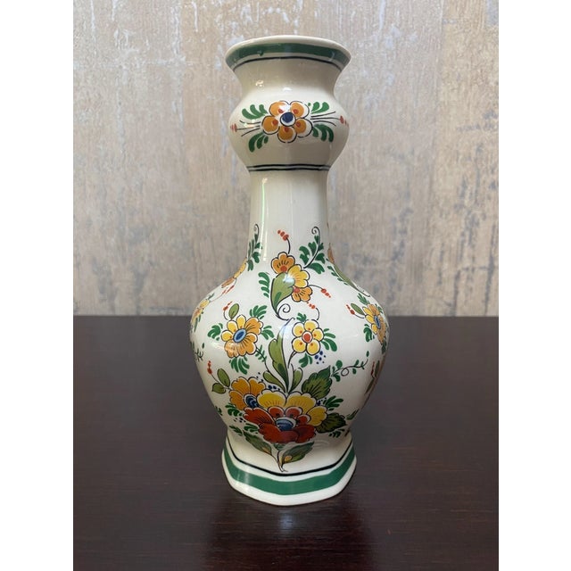 Add a touch of Dutch charm to your décor with this beautiful vintage Delft polychrome pottery vase from Holland. Standing...