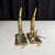 A well-made and thoughtfully designed pair of vintage swordfish bookends, cast in solid metal with a brass finish. Each...