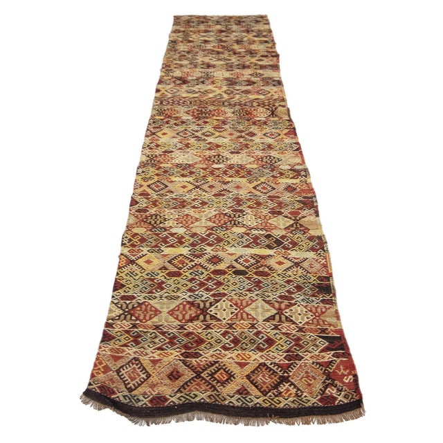 Handwoven vintage kilim rug from Denizli region of Turkey. Approximately 50-60 years old. In very good condition.