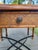 The Samba Game Table for Tommy Bahama's Island Estate collection features a warm maple top and inset cracked coco shell...
