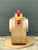 This vintage sculptural wood chicken stool combines whimsical folk-art character with practical seating. Carved from a...