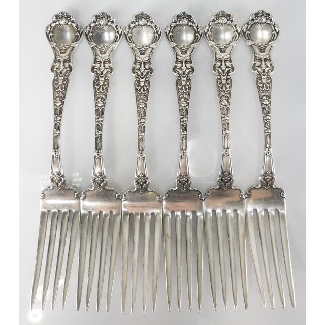 We are selling this stunning set of Sterling silver dinner forks by Alvin Manufacturing Company. Alvin is not a well known...