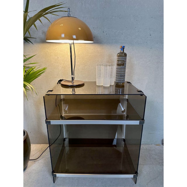 Vintage modular unit with smoked glass. Ideal for storing your hi-fi equipment and LPs. The shelves are easily adjustable...