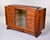 A sophisticated French Art Deco cabinet of exceptional quality, veneered in richly figured rosewood throughout with boldly...