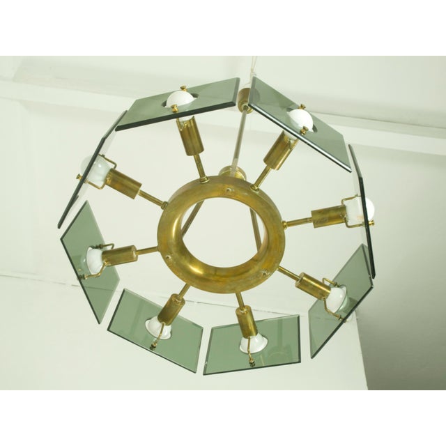 This large and elegant chandelier was manufactured in Italy in the 1960s. It was designed by Gino Paroldo and produced by...
