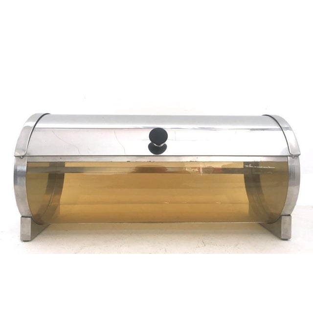 1960s Italian-made cone holder container. The container is in its original condition with a sliding handle in perfect...