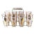 Vintage 1960s Fred Press Black Gold Highball Glasses in Brass Cart- 8 Pieces For Sale