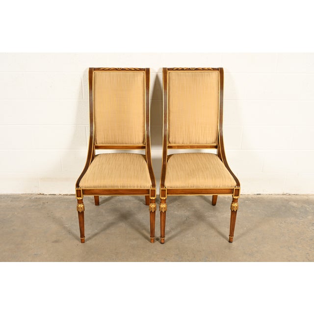 An outstanding pair of French Regency Louis XVI or Neoclassical style side chairs or dining chairs By Karges Furniture...