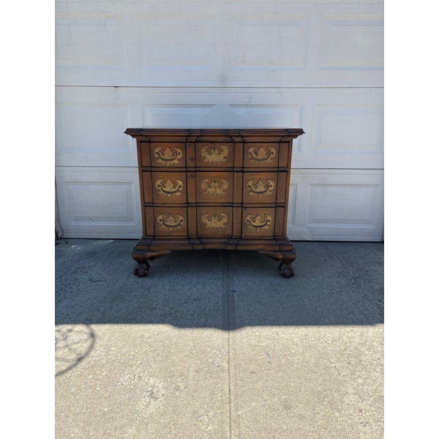 We have a beautiful vintage Spanish Revival bachelor’s chest for sale featuring ornate brass hardware, and carved claw...