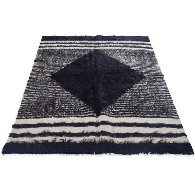 Vintage handwoven decorative kilim rug from Siirt region of Turkey. Approximately 40-50 years old. In very good condition.