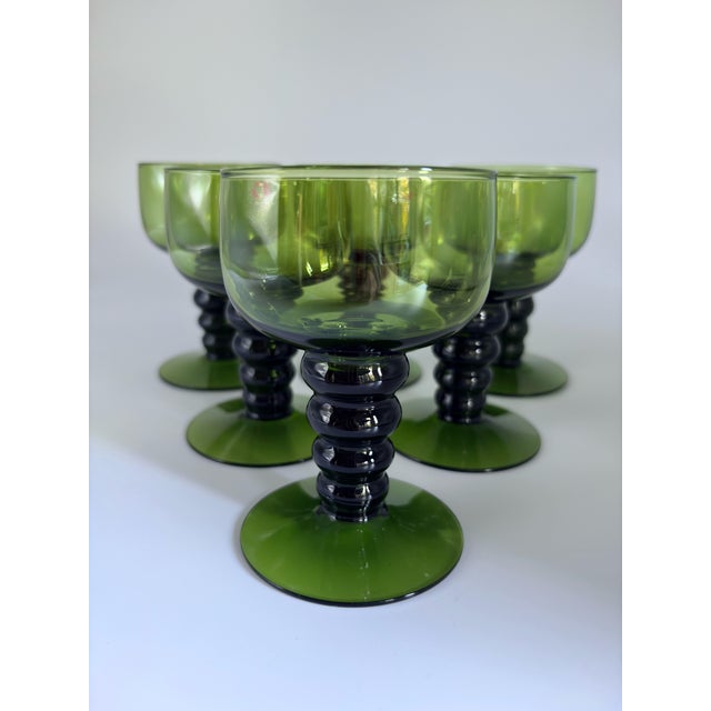 Beautiful set of six traditional 'Remmari' (Römer) white wine glasses, manufactured by the renowned Finnish glassworks...