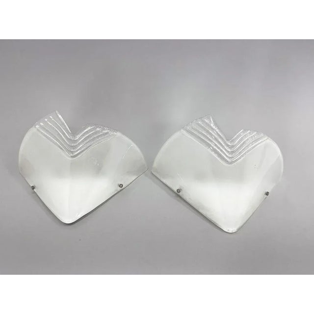 Set of two beautiful vintage Murano Glass Wall Lights. Made in Italy in the 1960's. Original label. Wear consistent with...