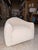 Add sculptural elegance to your home with this contemporary accent chair, upholstered in soft ivory bouclé for a warm,...