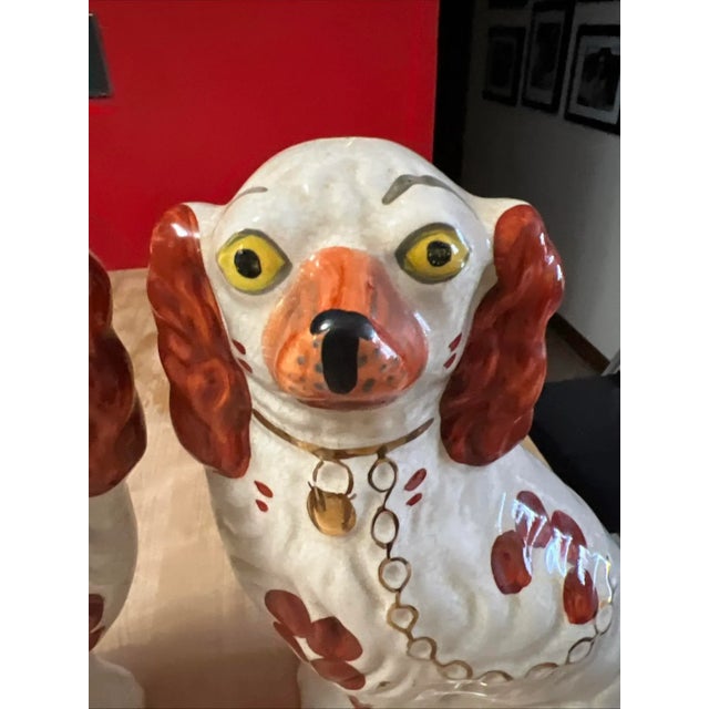 A Fine Pair of Antique Decorated Staffordshire dogs, circa 1860's Made in the Staffordshire district of Stoke on Trent,...