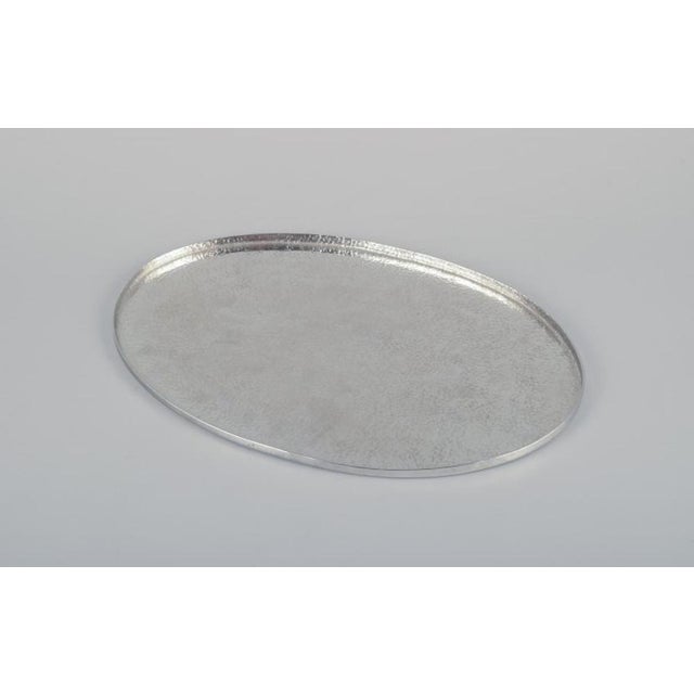 Lars göransson, swedish designer. Hammered modernist tin tray. Date stamp f 10. 1978. In perfect condition. Marked....