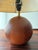 The spherical base makes this Danish table lamp by Kirk Copenhagen special. Not turned from a single piece, but...