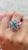 This is part of Chairish’s Fine Jewelry assortment. Emerald and ruby flower cocktail ring in 14K gold which perfectly goes...