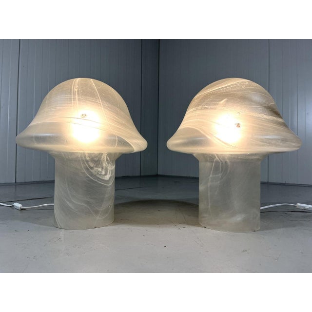 A set of 2 beautifull table lamps by Peill & Putzler, Germany (marked). Model mushroom in white/grey glass with waving...