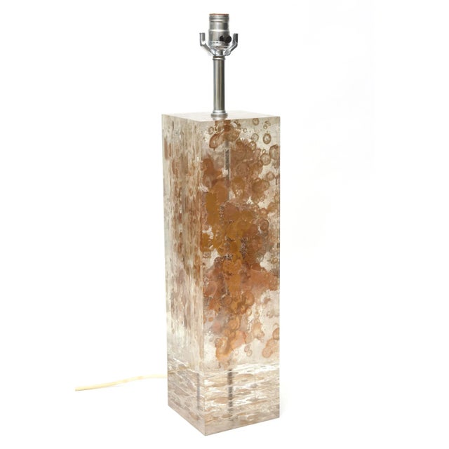 This amazing and stunning thick walled French vintage lucite column desk, table or console lamp is attributed to the work...