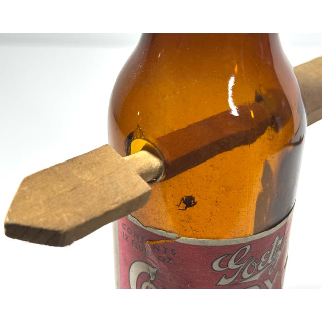 Mid 20th Century Folk Art Arrow Through Goetz Beer Bottle: Whimsical Display Piece For Sale - Image 5 of 10
